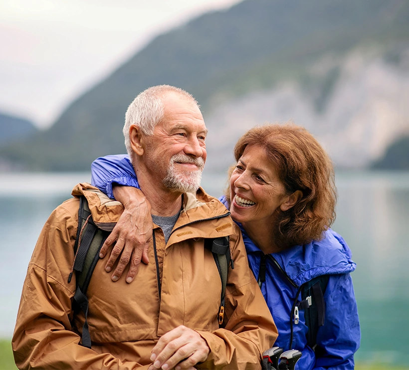 cheerful older couple enjoying the outdoors